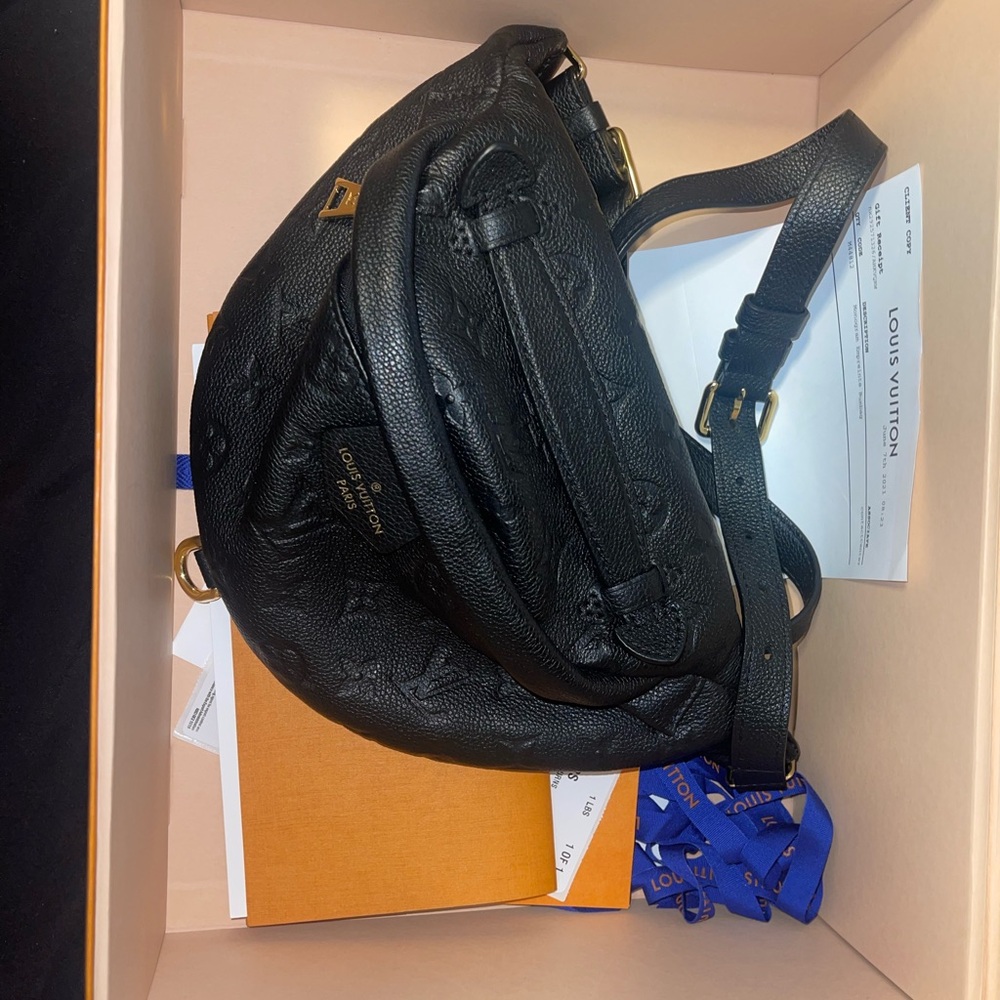 Authentic Monogram Empriente Louis Vuitton Leather Bum Bag in great condition